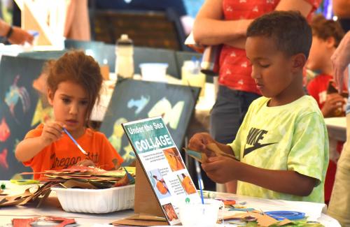 two kids painting